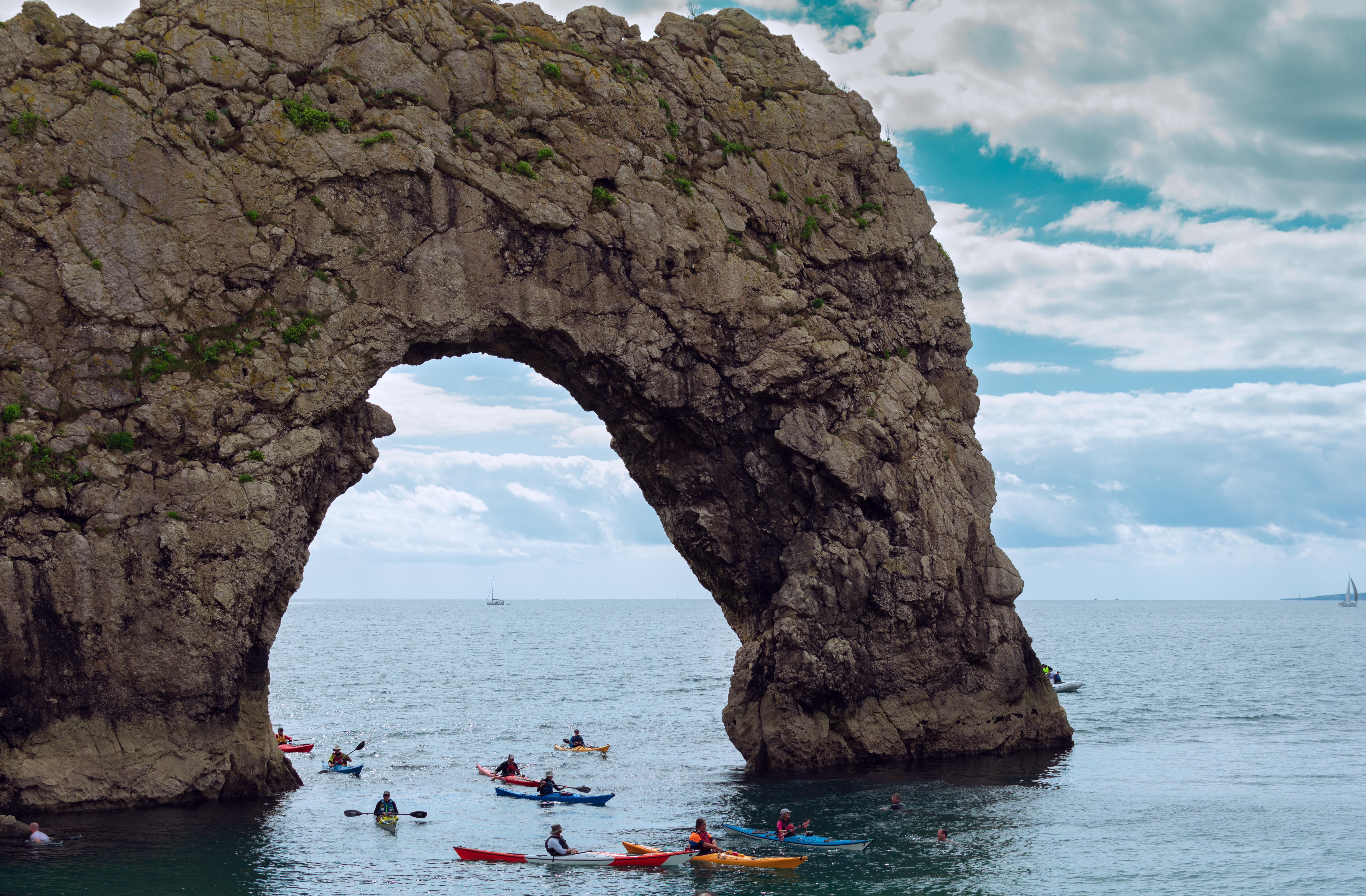 people kayaking in durdle door